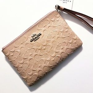 COACH • PINK BLUSH EMBOSSED SPARKLY WRISTLET